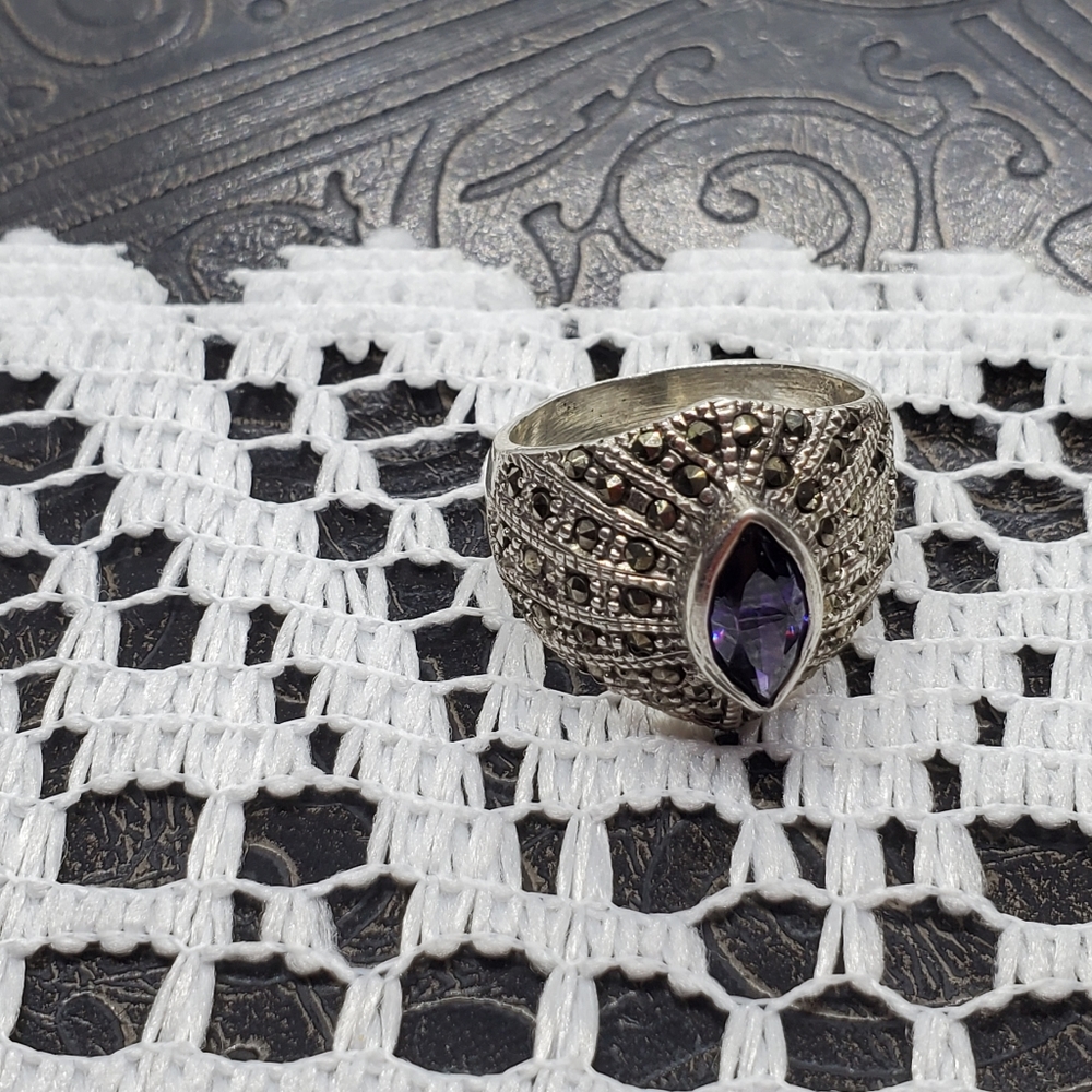 Silver and marcasite ring with purple stone
